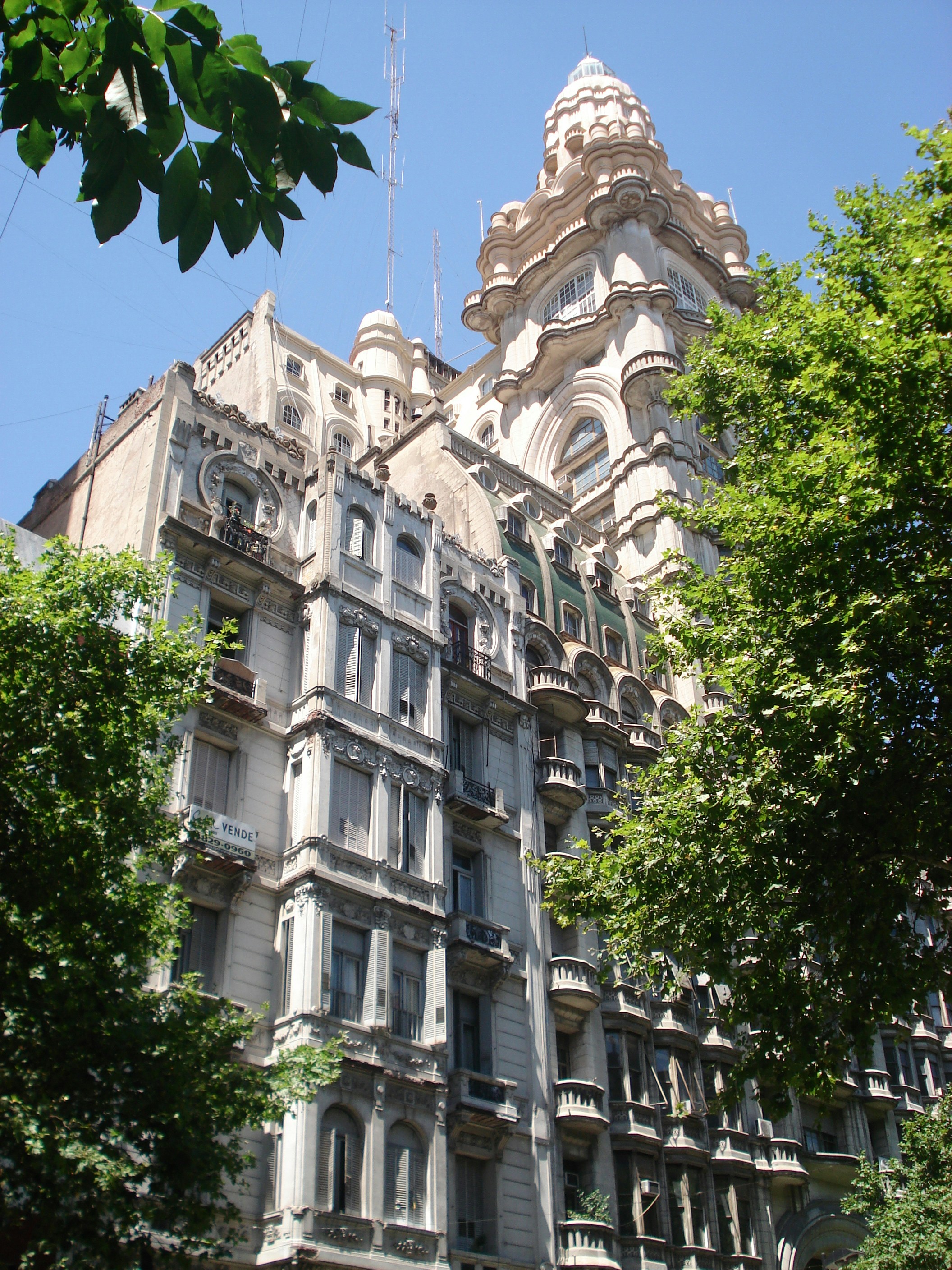 White residential building with greenery